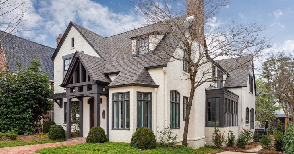 White brick Tudor home in Atlanta whose buyers need to hire a home inspector